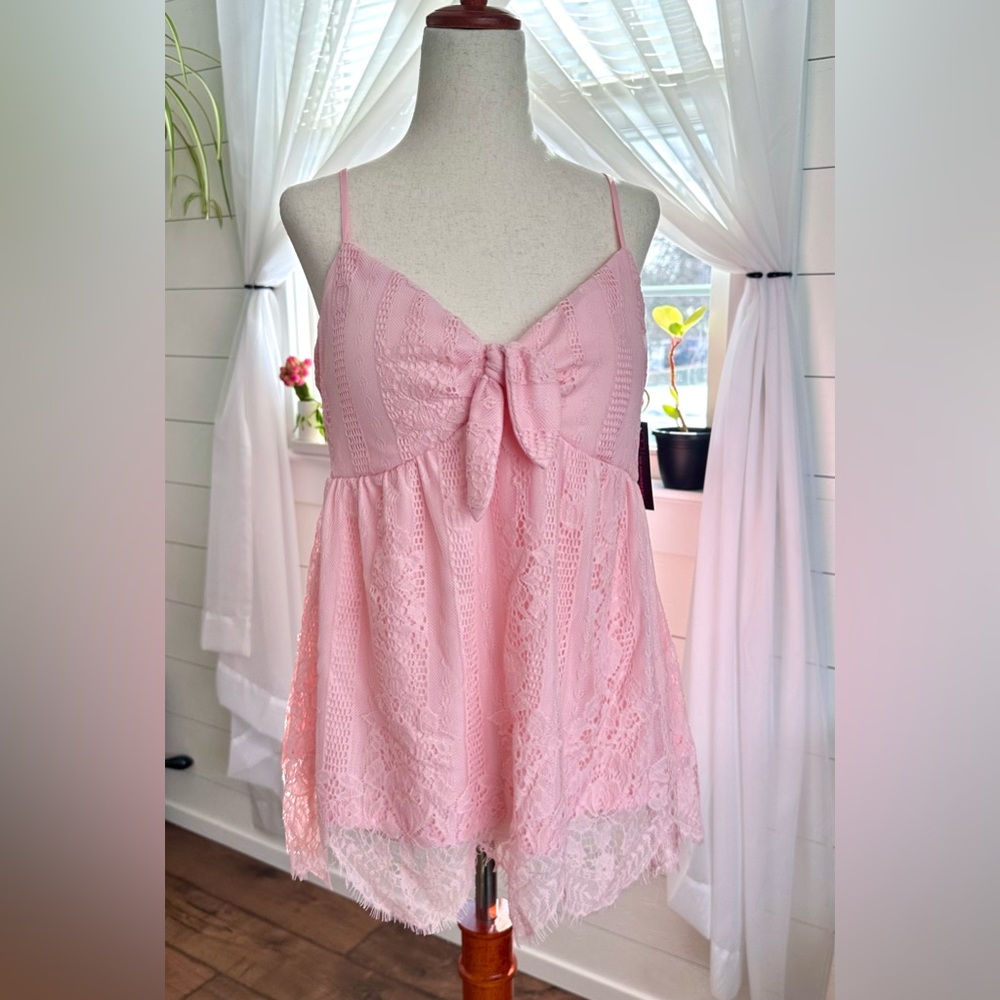 No Boundaries Lace Tie Front Tank top 
Pink Quartz. NWT!
Size: Large 11-13